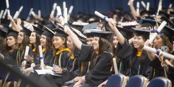 Graduates at commencement