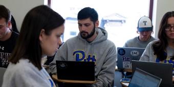 Students working on laptops