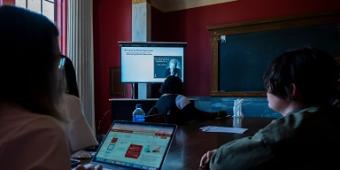 individuals watchng a computer presentation